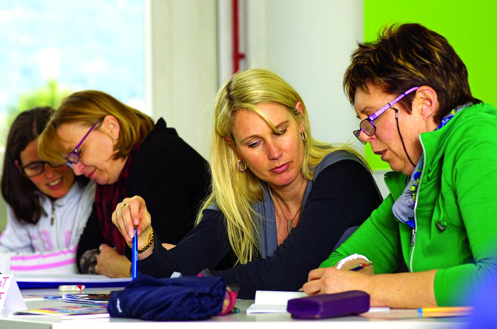 Team collaborating on high-tech problem solving solutions